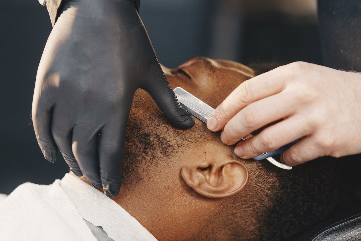 Men's grooming service at Deluxe Glow Esthetic Bar