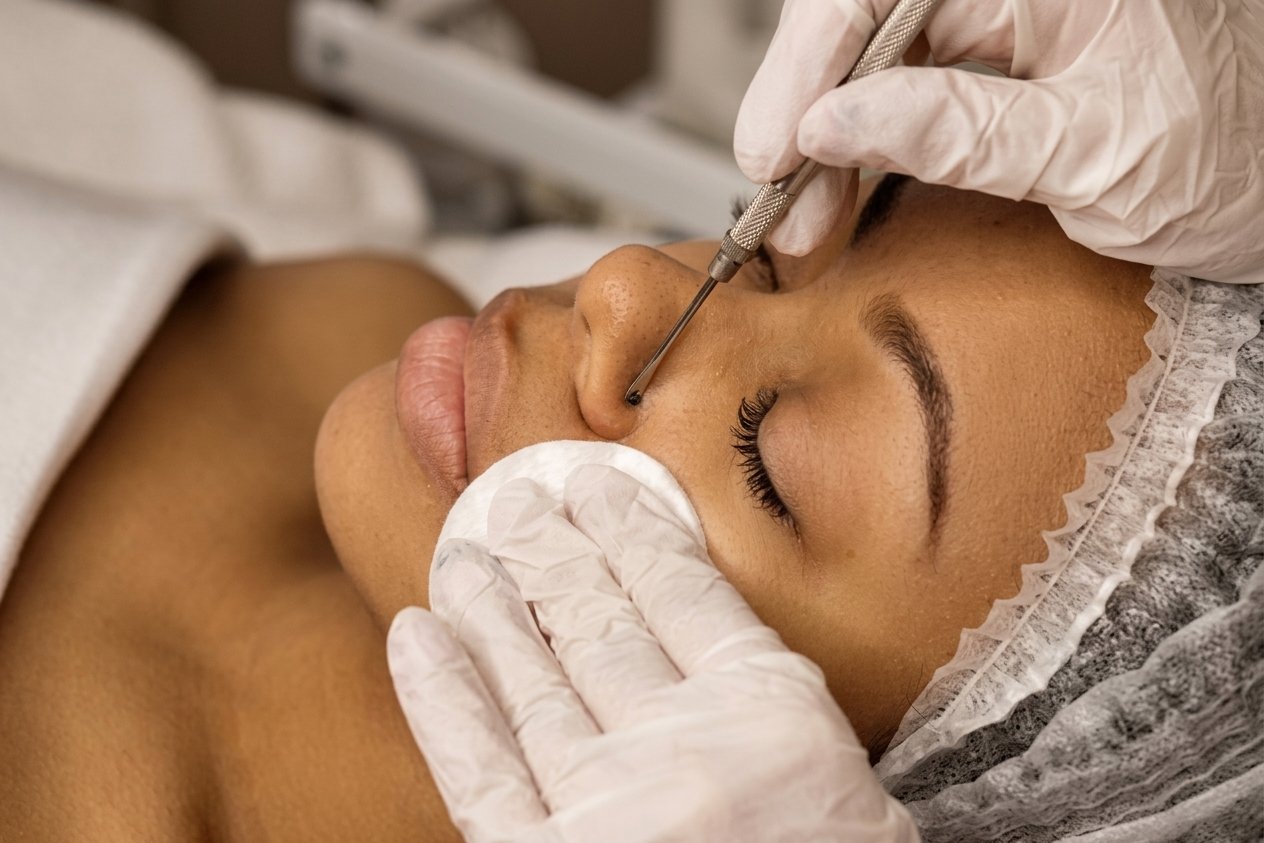 Professional facial treatment at Deluxe Glow Esthetic Bar