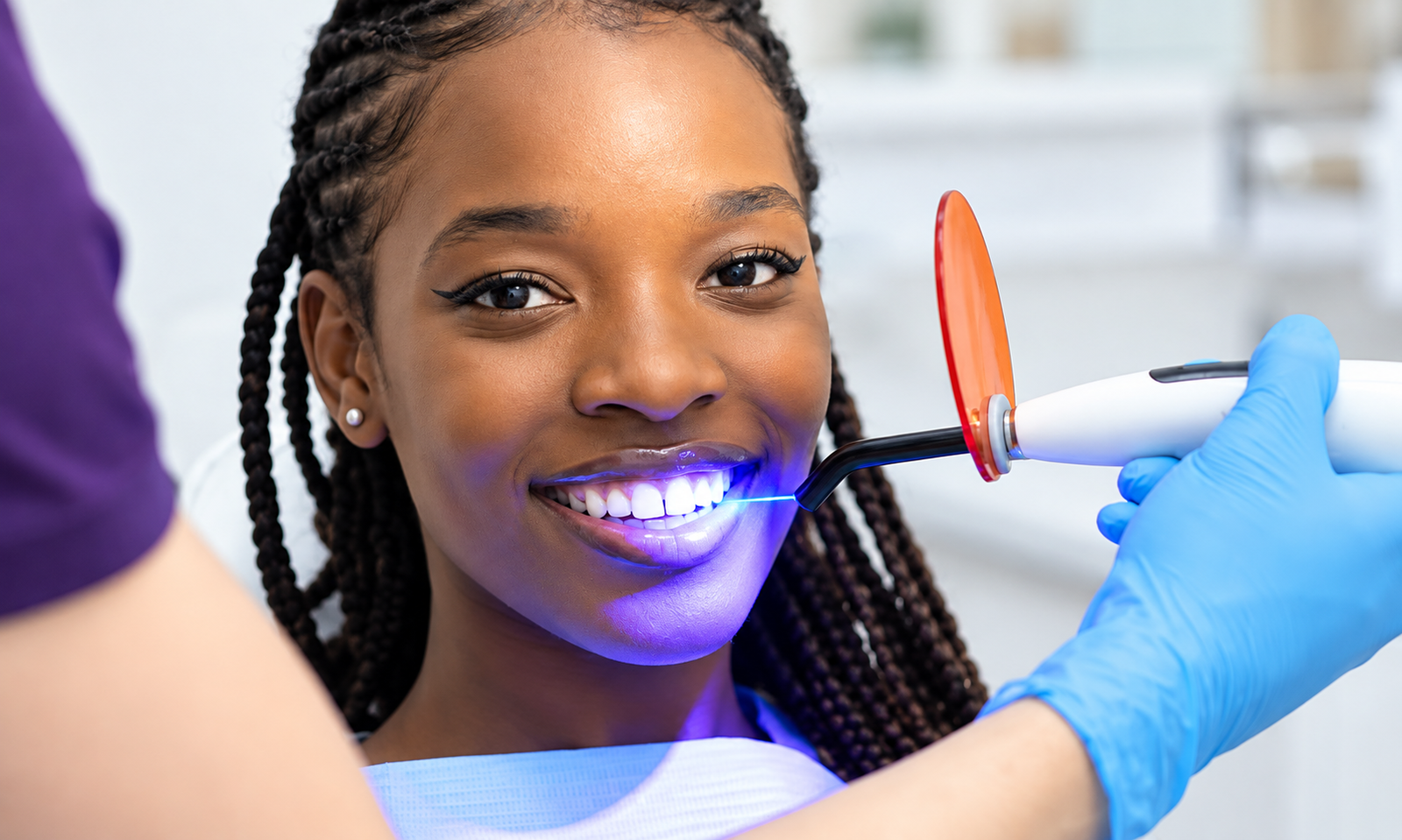Professional teeth whitening service at Deluxe Glow Esthetic Bar